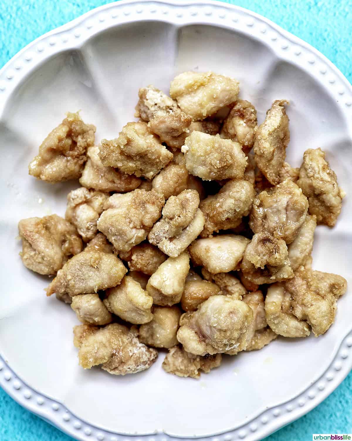 Air fryer teriyaki chicken in a bowl.