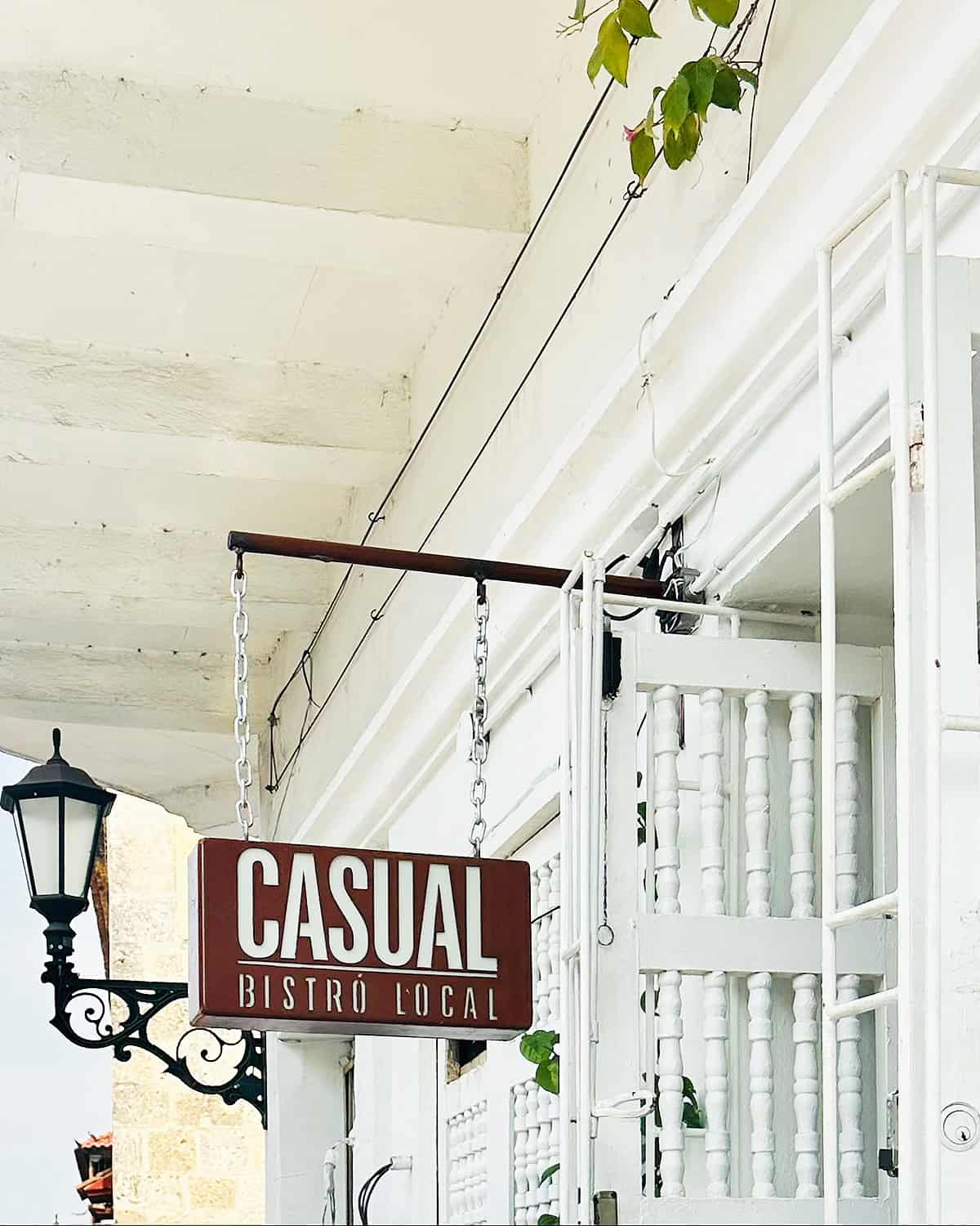 Casual Bistro Local sign and front door.