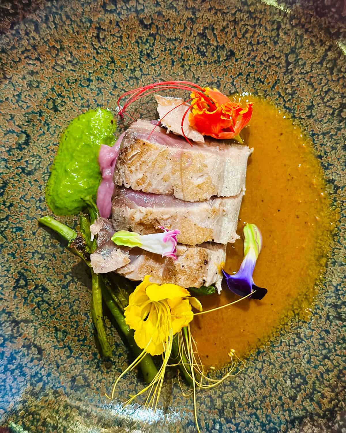 tuna with edible flowers.