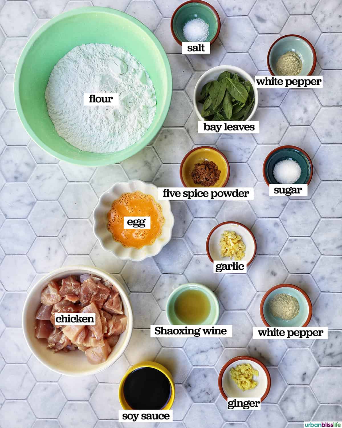 bowls of ingredients to make Taiwanese popcorn chicken with fried basil.