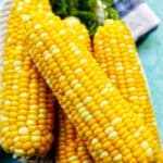 stack of corn on the cobs.