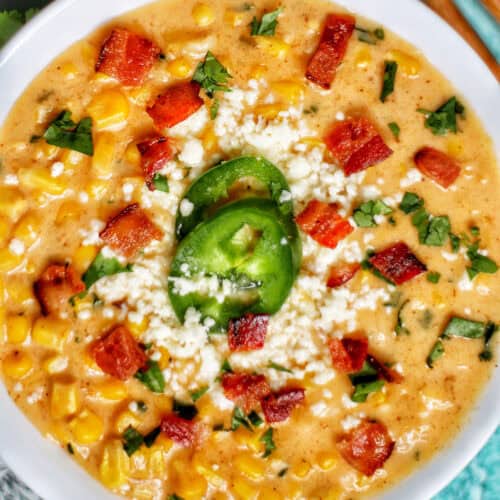 bowl of Instant Pot Mexican Street Corn Chowder with bacon, jalapenos, and Cotija cheese.