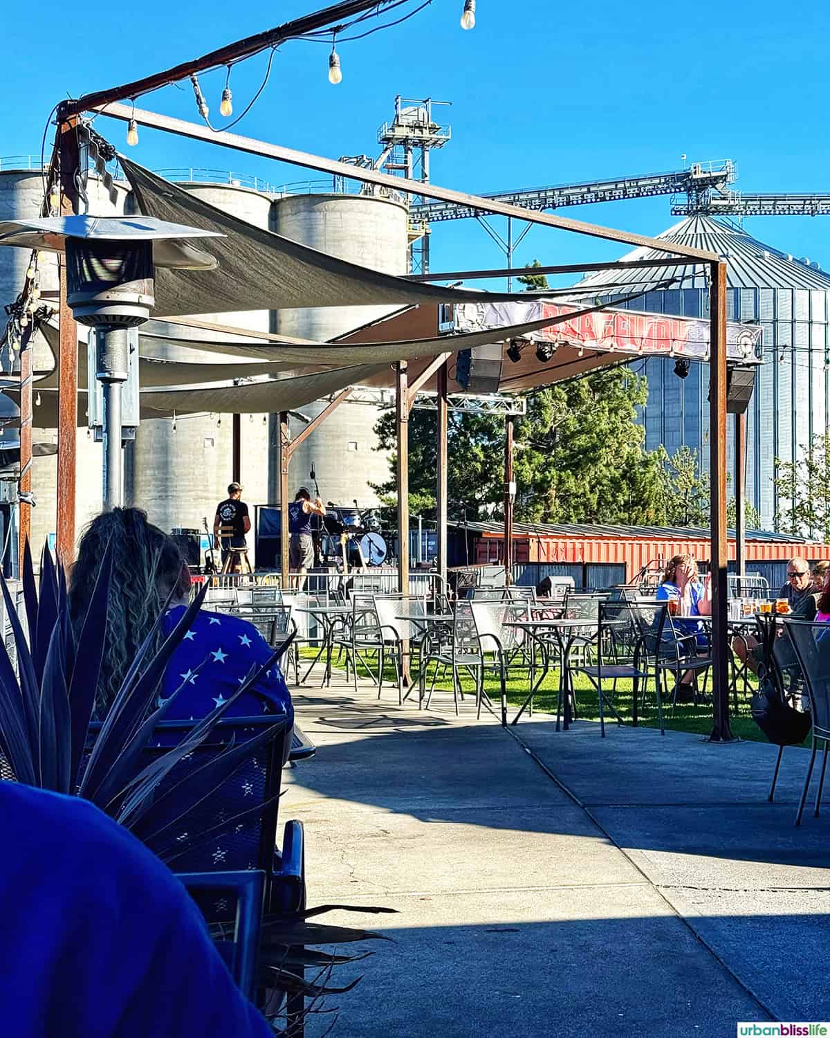 outside patio with live music stage at Bargeway Pub in The Dalles, Oregon.
