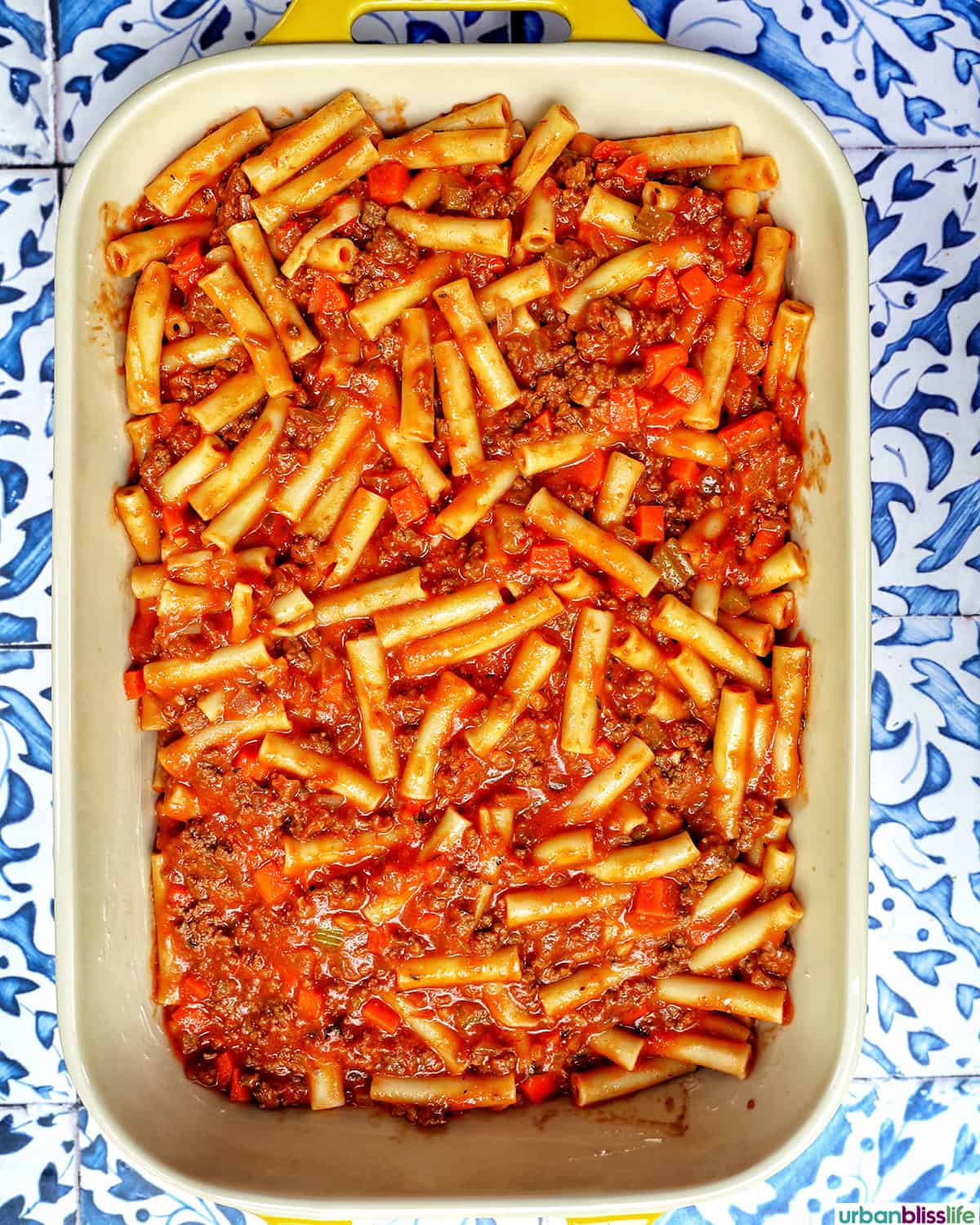 layers to make baked pasta bolognese.