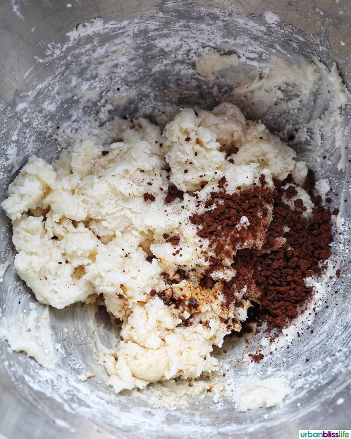 coffee cream cheese frosting in a stand mixer bowl.