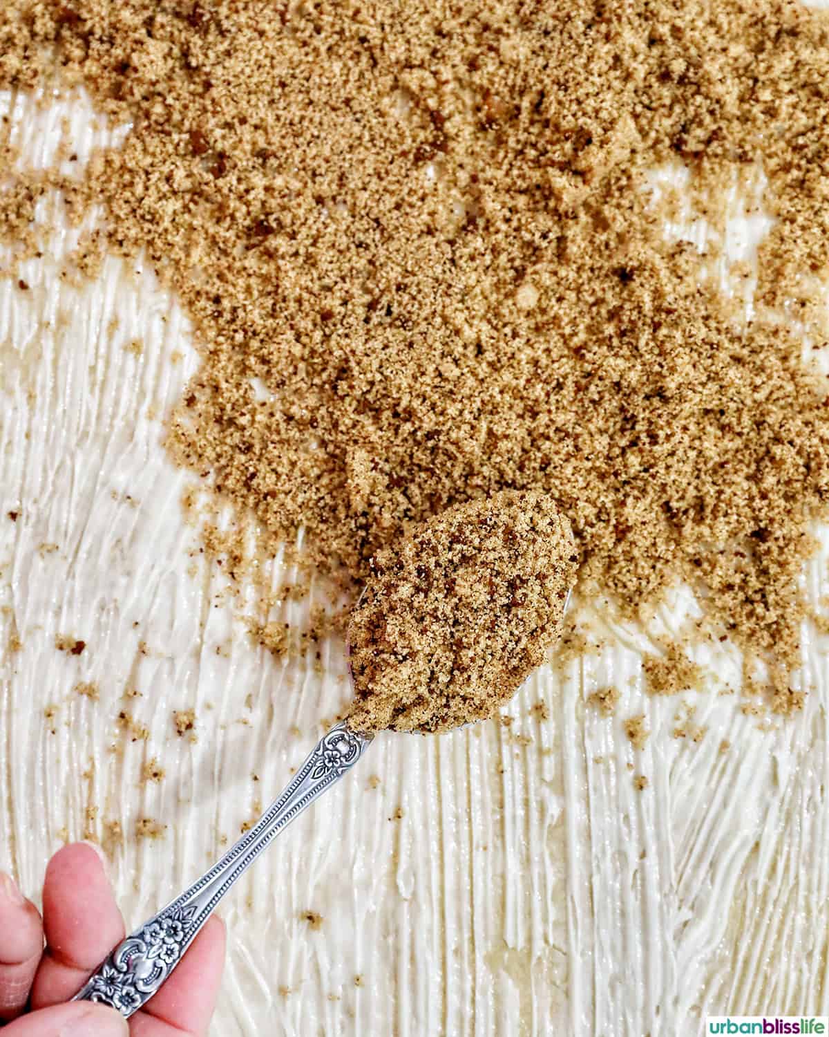 sprinkling filling to make coffee cinnamon rolls.
