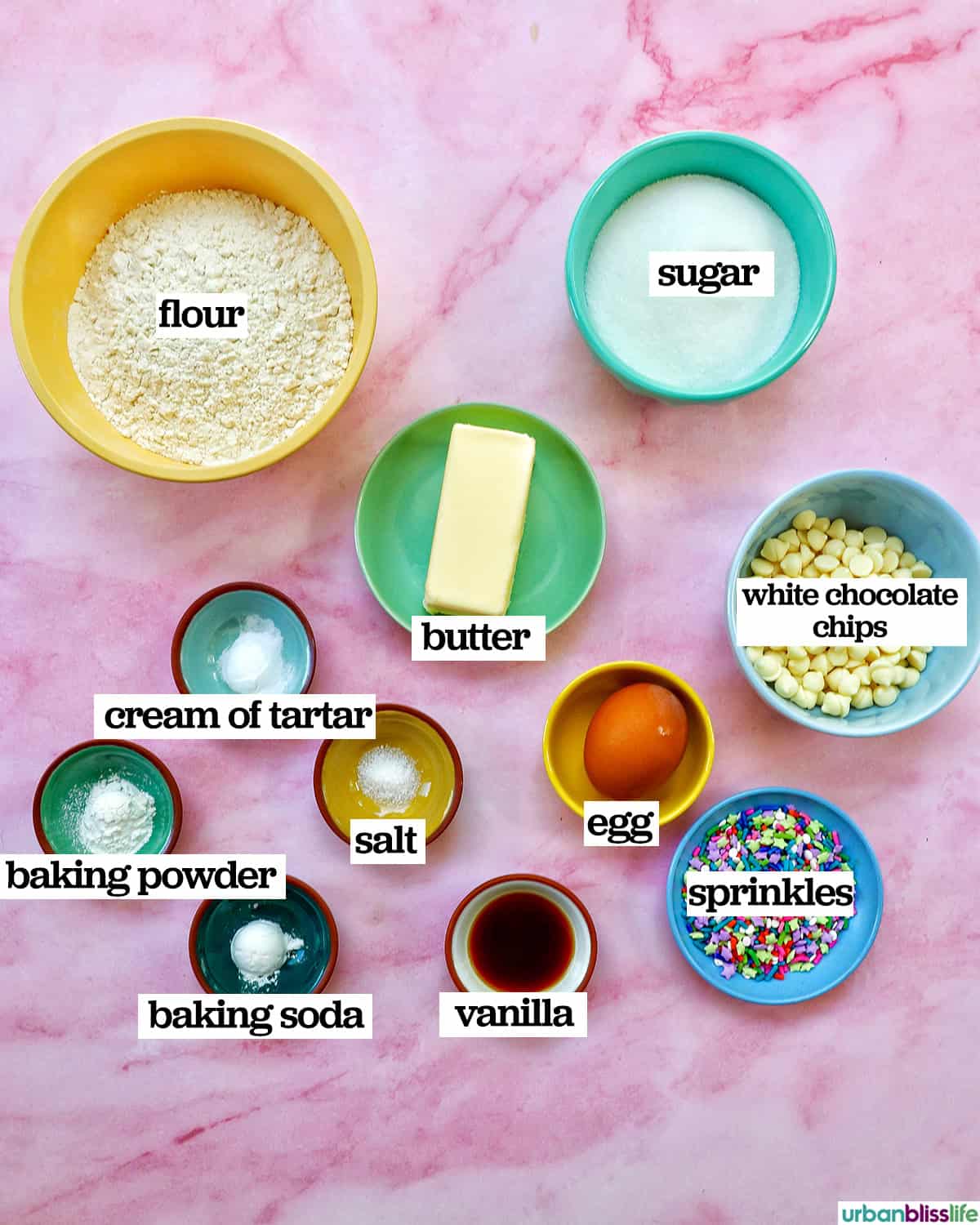 bowls of ingredients to make Sugar Cookie Confetti Cake.