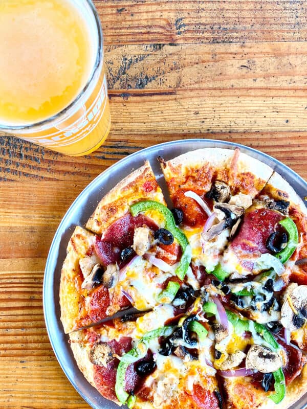 glass of beer with pizza