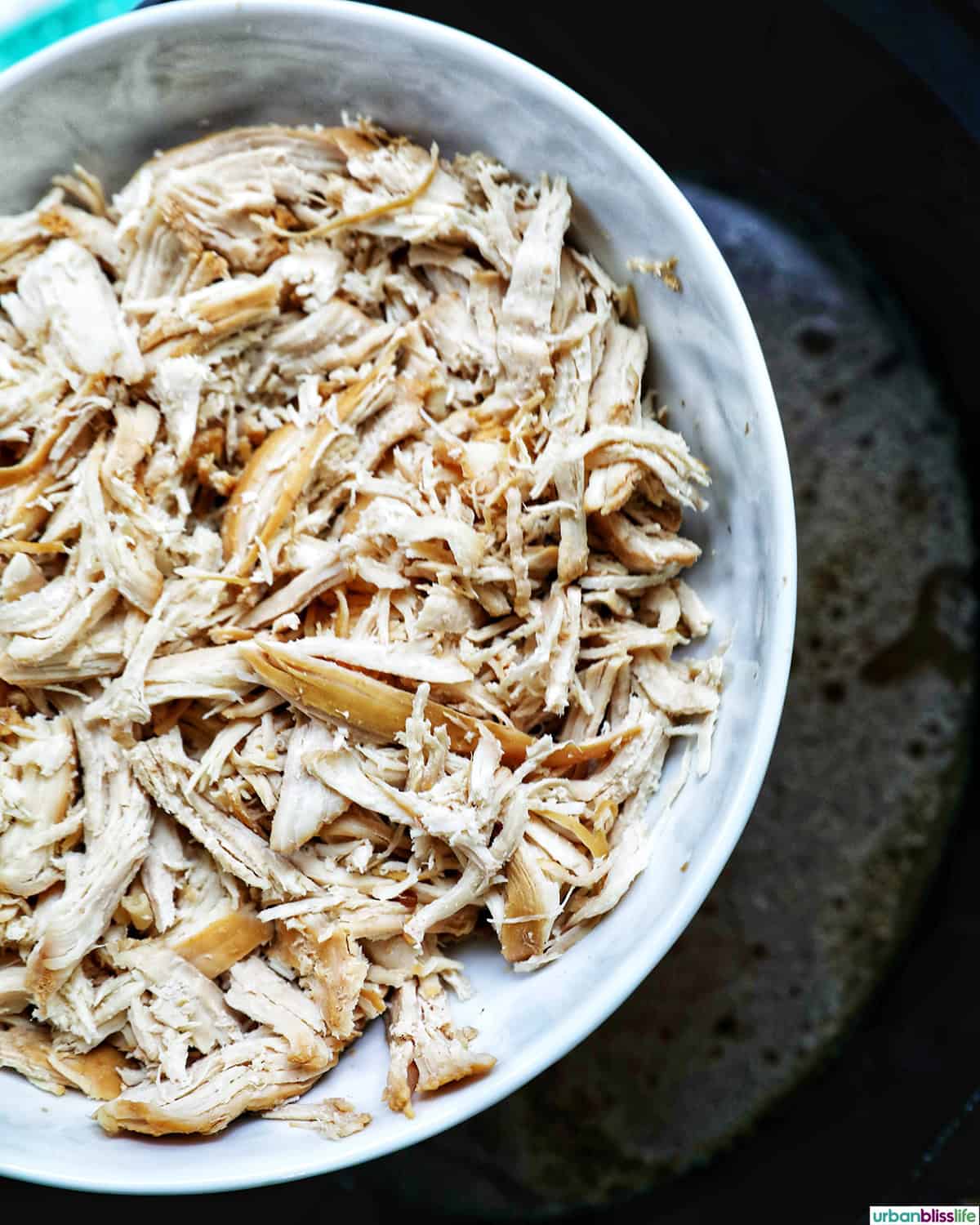 shredded chicken in a bowl.